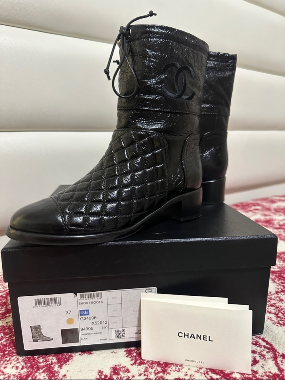 CHANEL Black Quilted Crumpled Calfskin Leather Short Boots with CC Logo